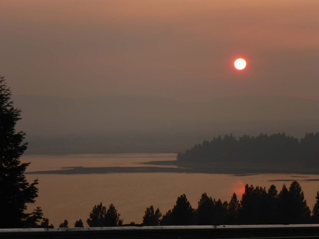 Sun in smoke over Lake Almanor. D. Burk.