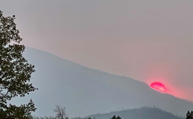 Smoky sunset. C. Harvey.