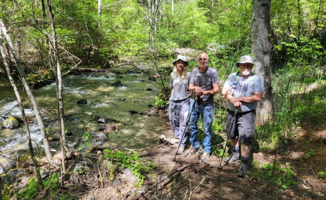 Shirley, Chris and Bob standing next to East Weaver Creek. D. Mandel.