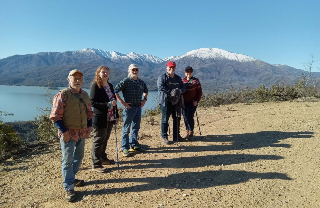 Hikers, lake and Shasta Bally. D. Ledger.