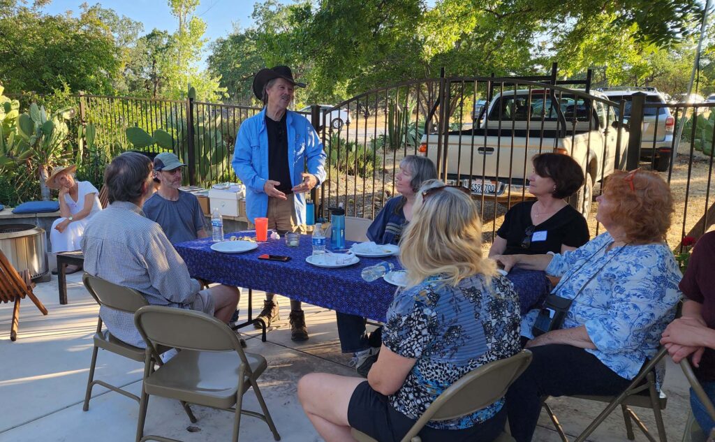 David Ledger talking to the group. L. Burk.