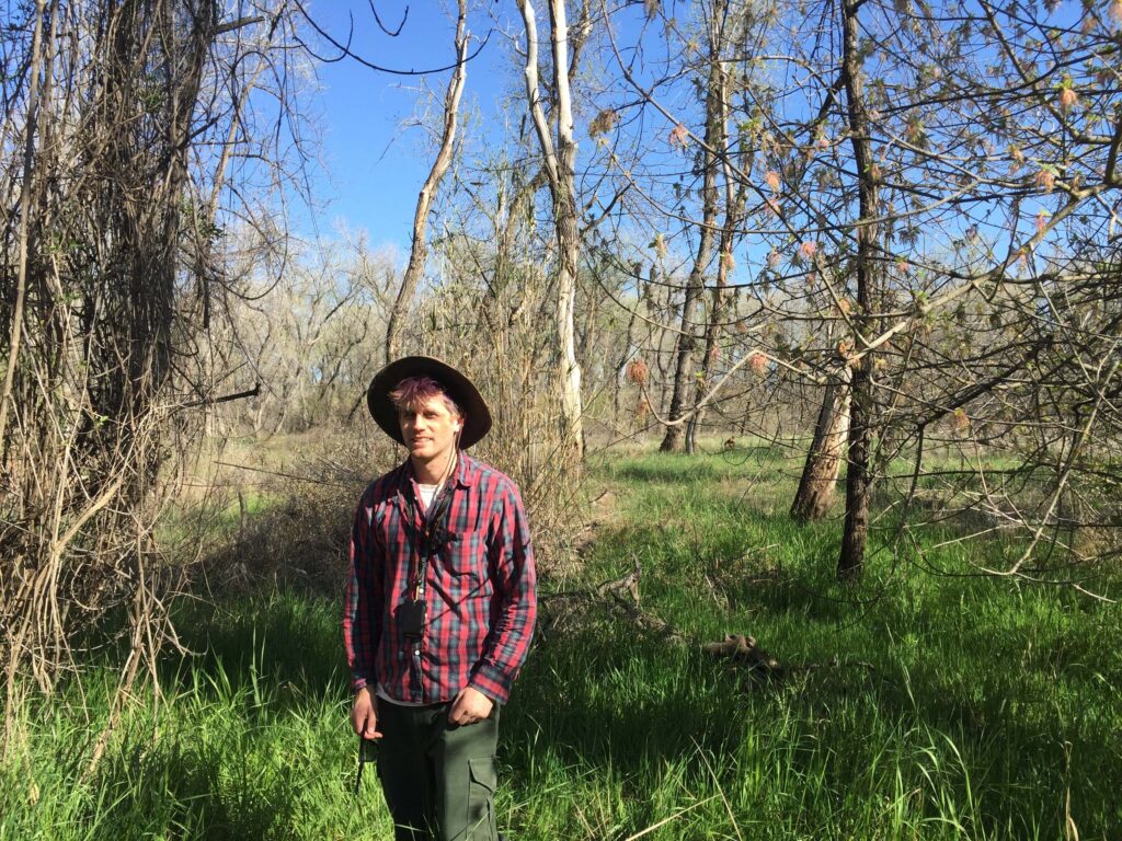 Brook Constantz in a remnant forest near Sacramento River National Wildlife Refuge, Rio Vista Unit. J. Armas.