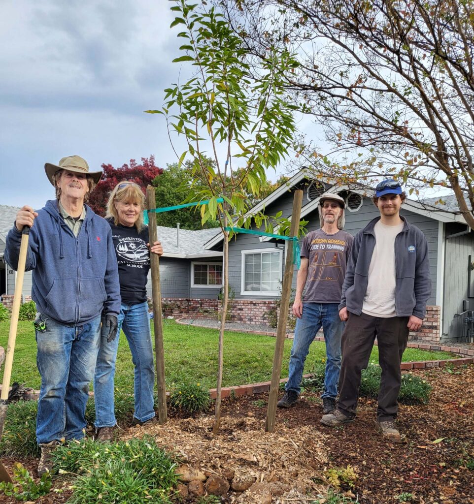 SEA crew and newly planted tree. D. Mandel.