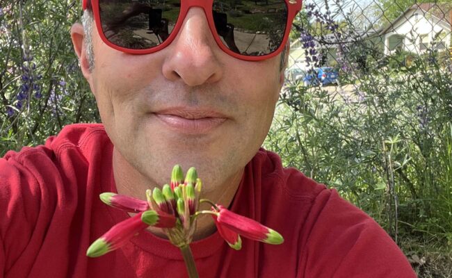 Jeremey and firecracker-flower. J. Kelley.