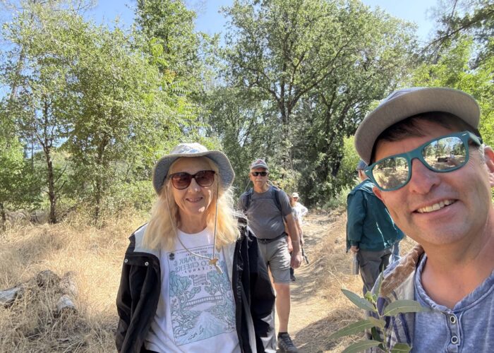 Picnic attendees walking on the trail. Photo by J. Kelley.