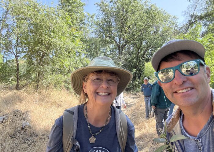 Jeremey taking a selfie with an attendee at the picnic potluck. Photo by J. Kelley.