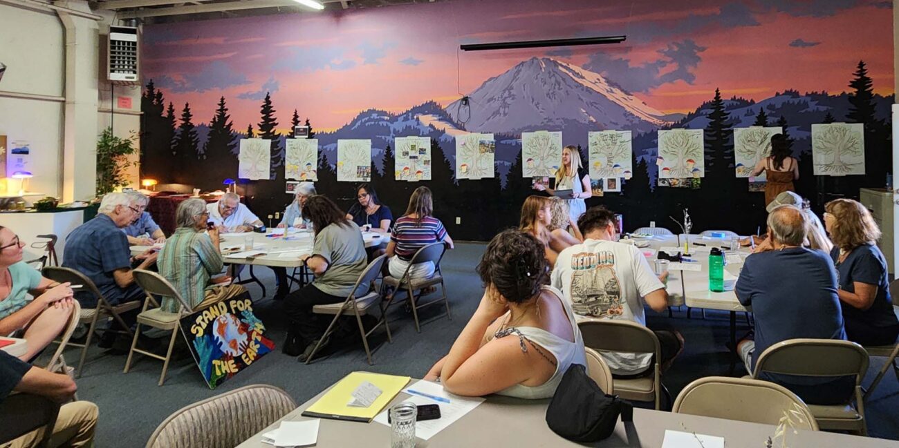 Holly White-Wolfe addressing Moving Forward Together participants. SEA.