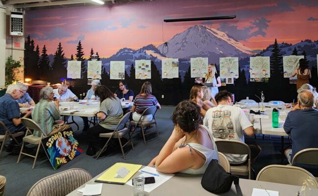 Holly White-Wolfe addressing Moving Forward Together participants. SEA.