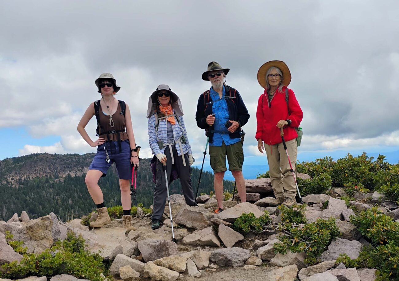 A group of four hikers on the Gray Butte and Panther Meadows field trip on Mount Shasta. Photo by D. Ledger.