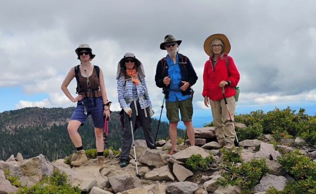 A group of four hikers on the Gray Butte and Panther Meadows field trip on Mount Shasta. Photo by D. Ledger.
