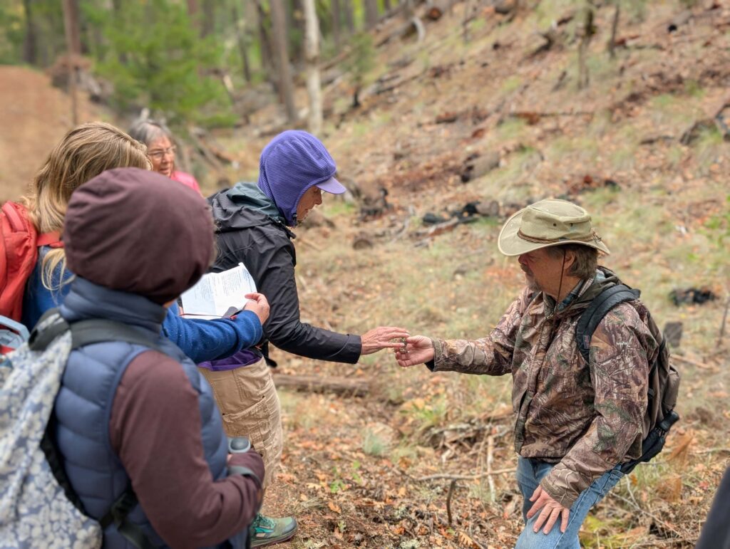 David Ledger showing lichen to the group at East Weaver Creek on October 12, 2025 by Ren Redlich