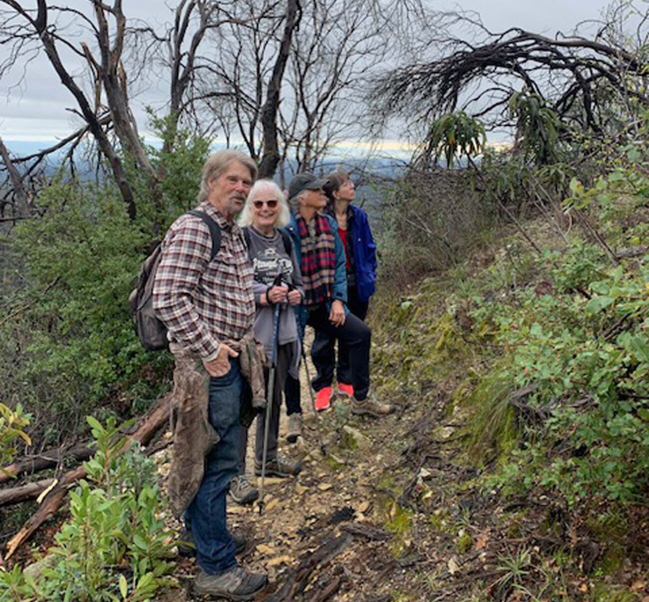 David Ledger and other hikers on the trail in Swasey Recreation Area on Feb. 23, 2026. Photo by S. Harrison.