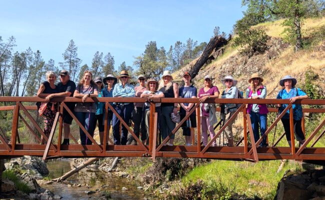 Hikers on bridge over Salt Creek. R. Redlich.